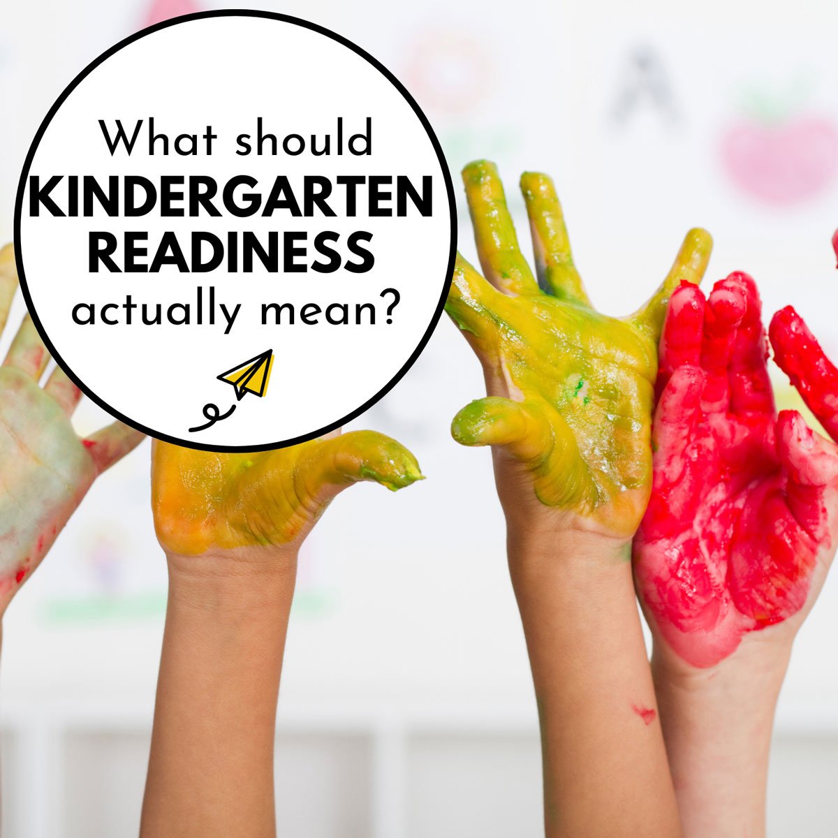 Kid hands covered in paint are raised in the air. The text says "What should kindergarten readiness actually mean?"