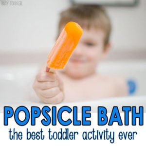 POPSICLE BATH: the best toddler activity ever! This is the one toddler activity you need to be doing at home. The perfect bath time activity for grumpy or sick toddlers. Busy Toddler.